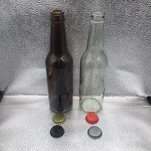 Top Quality 330 ML Clear Amber Beer Glass Bottle with Colourful Metal Crown Cap