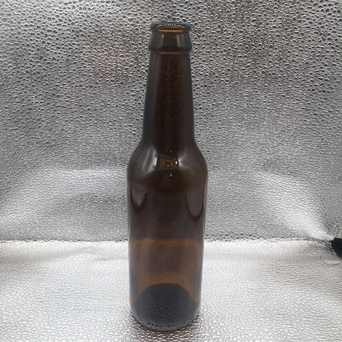 Top Quality 330 ML Clear Amber Beer Glass Bottle with Colourful Metal Crown Cap