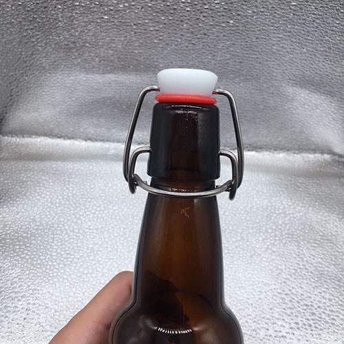 330 ML Clear Amber Swing Clasp Lock Cap Beer Beverage Glass Bottle for Wholesale