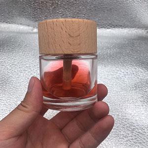 Wholesale 50 ML Clear Round Glass Aromatherapy Perfume Jar with Wooden Cap