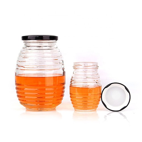China Bulk Sale Supplier Beehive Honeycomb Shape Honey Glass Jars Bottle with Screw Metal Cap