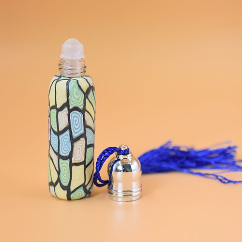 China Supplier Manufacture Cosmetic Polymer Clay Vial  Makeup Perfume Essential Oil Portable Refillable Roll On Ball Glass Jar with Tassel Cap