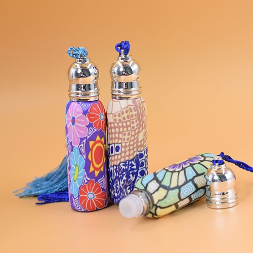 China Supplier Manufacture Cosmetic Polymer Clay Vial  Makeup Perfume Essential Oil Portable Refillable Roll On Ball Glass Jar with Tassel Cap