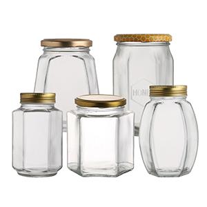 China Supplier Best Price Wholesale Clear Food Grade Storage Hexagon Glass Bottle Jar Container for Pudding Jelly Jam Honey with Metal Screw Cap