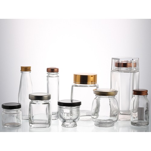 China Supplier Best Price Wholesale Clear Food Grade Storage Hexagon Glass Bottle Jar Container for Pudding Jelly Jam Honey with Metal Screw Cap