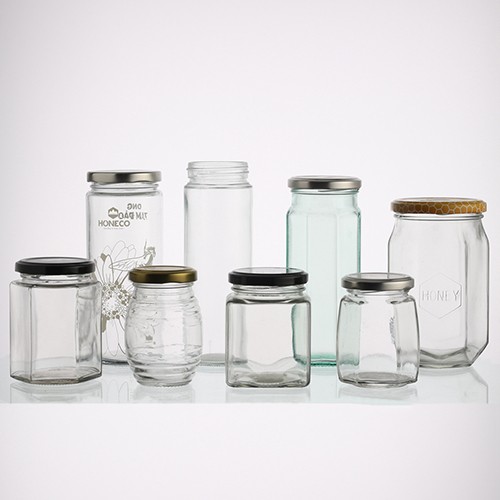 China Supplier Best Price Wholesale Clear Food Grade Storage Hexagon Glass Bottle Jar Container for Pudding Jelly Jam Honey with Metal Screw Cap