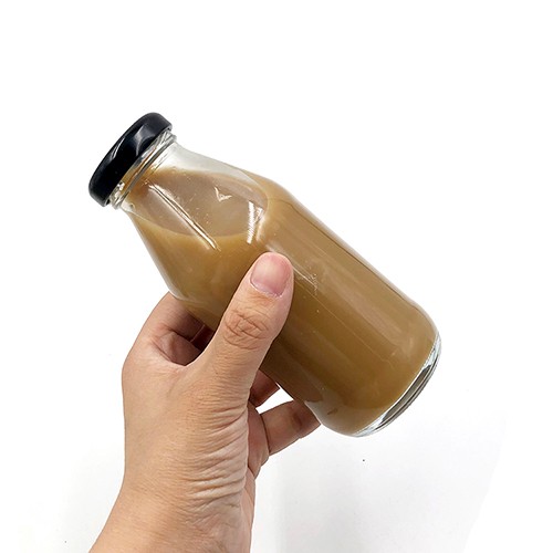 Wholesale Glass Beverage Milk Bottle Round Empty Jar with Twist Off Seal cap Has Leakproof Aprons