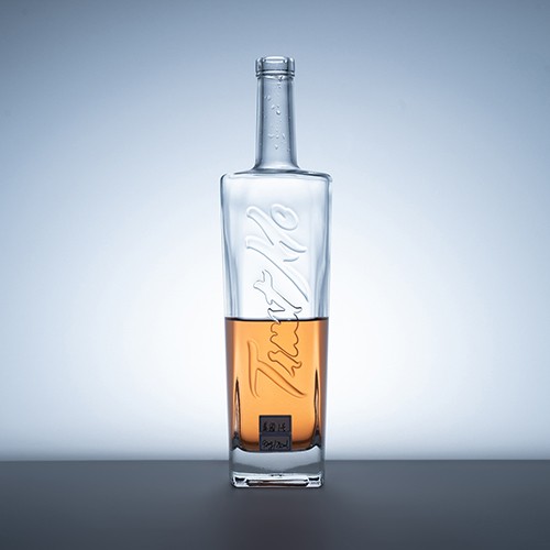 Wholesale Glass Wine Bottle Appealing Clear Embossing Bottle for Whisky Vodka from China Manufacturer 