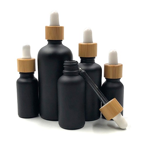 Wholesale Clear Amber Black Glass Cosmetic Essential Oil Spray Dropper Bottle for Emulsion Serums 