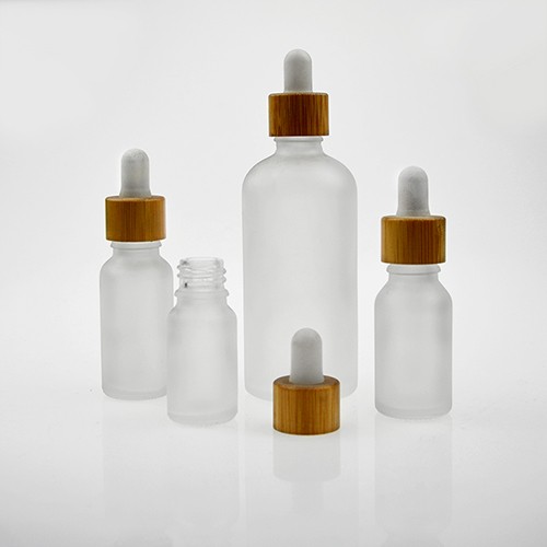 Wholesale Clear Amber Black Glass Cosmetic Essential Oil Spray Dropper Bottle for Emulsion Serums 
