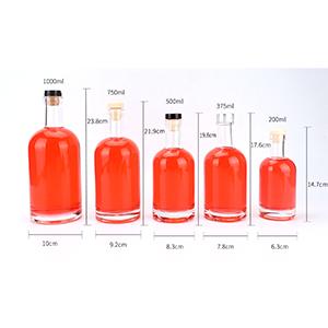 Wholesale transparent round empty Crystal glass liquor wine Whisky Vodka tequila bottle with sealed Silicone cork lid