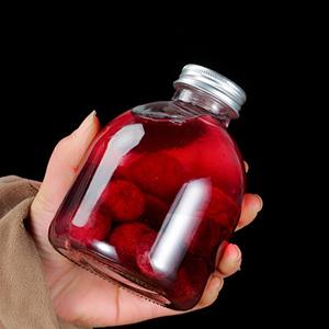 Wholesale Glass Beverage Bottle Buy Cheap in Bulk Empty Glass Jar for Fruit Wine Juice