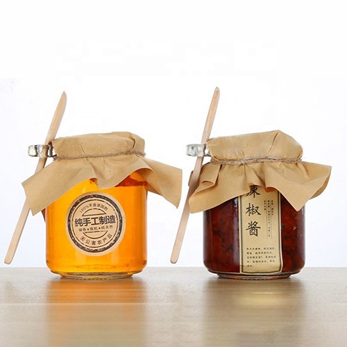 Wholesale Glass Honey Jar Buy Cheap Price Factory Personalized Honey Glass Bottle with Wooden Spoon and Paper Logo