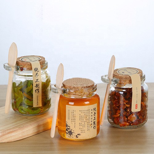 Wholesale Glass Honey Jar Buy Cheap Price Factory Personalized Honey Glass Bottle with Wooden Spoon and Paper Logo