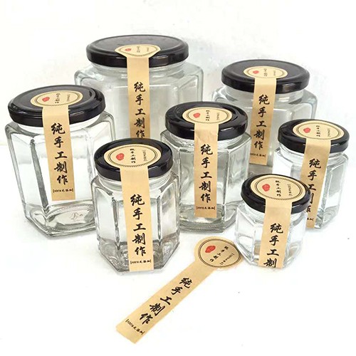 Wholesale Hexagon Honey Food Storage Clear Glass Jar With Cap