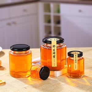 Wholesale Honey Glass Jar Hexagon Clear Bottle from Factory Supplier at Cheap Price