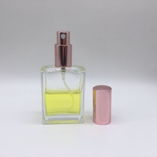 Wholesale 55 ML Refillable Empty Transparent Rectangle Perfume Glass Bottle with Pump Sprayer 