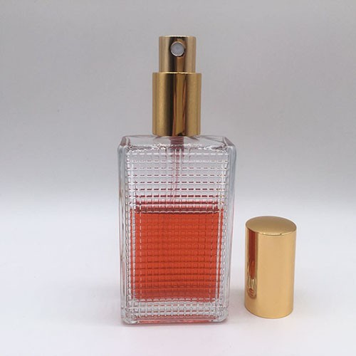 Wholesale 55 ML Refillable Transparent Rectangle Atomizer Perfume Glass Bottle for Skincare