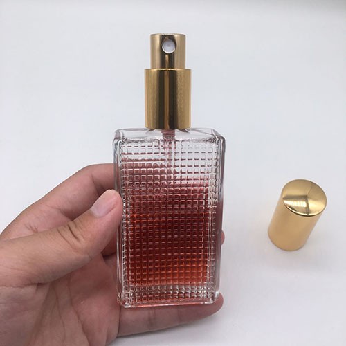 Wholesale 55 ML Refillable Transparent Rectangle Atomizer Perfume Glass Bottle for Skincare